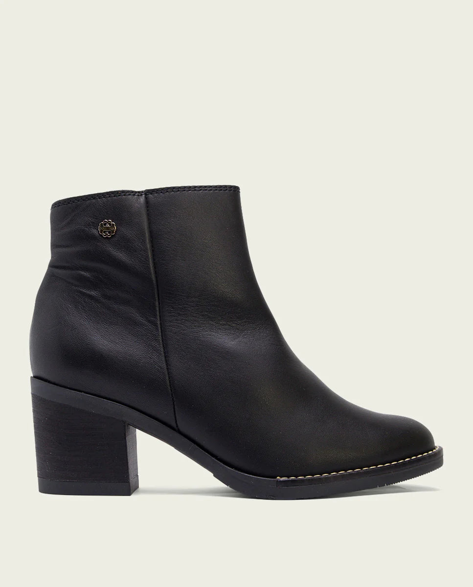 The Inside Zip Ankle Bootie in Black